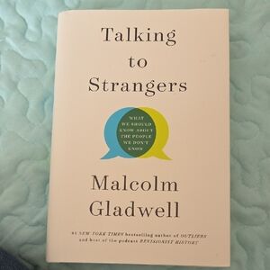 Talking to Strangers by Malcolm Gladwell - White Cover with Blue & Green Accent